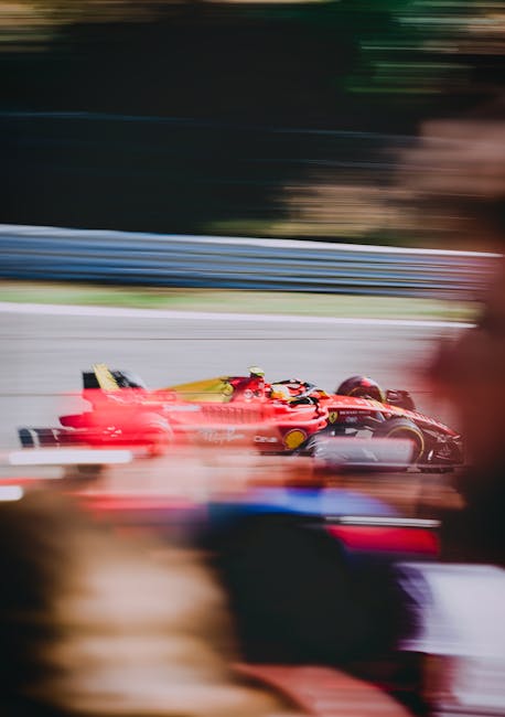 Racing car drifting with smoke on a Moscow speedway, showcasing speed and agility.
