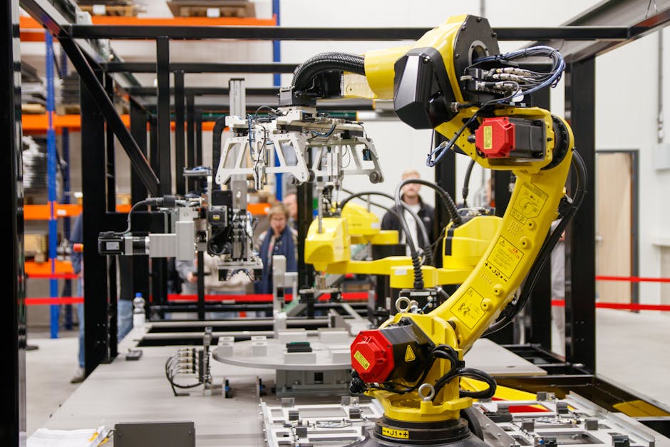 Detailed view of a toy robot holding a metallic screw, surrounded by tools.